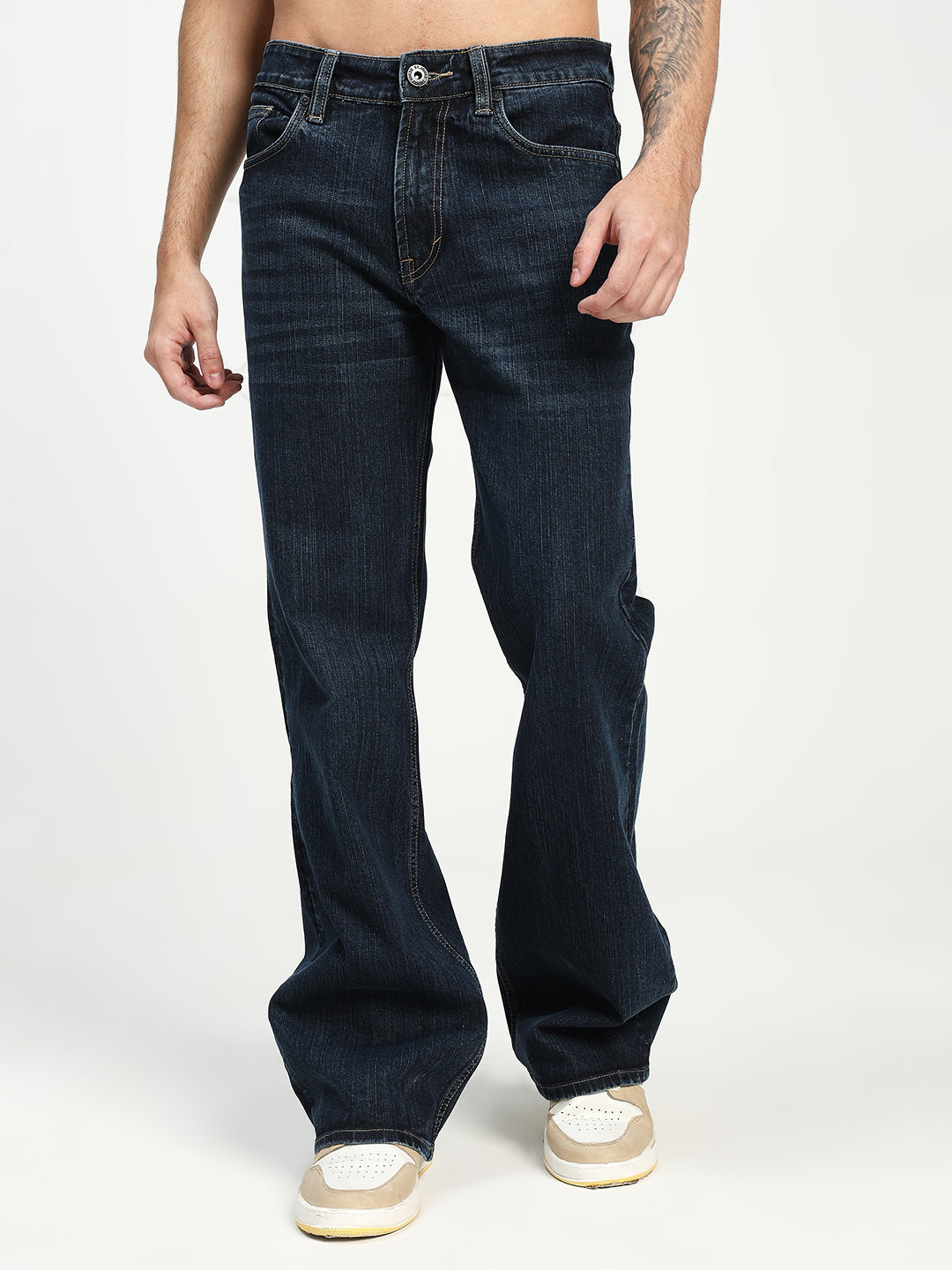 Man Wearing Bell Bottom Jeans on white background 
