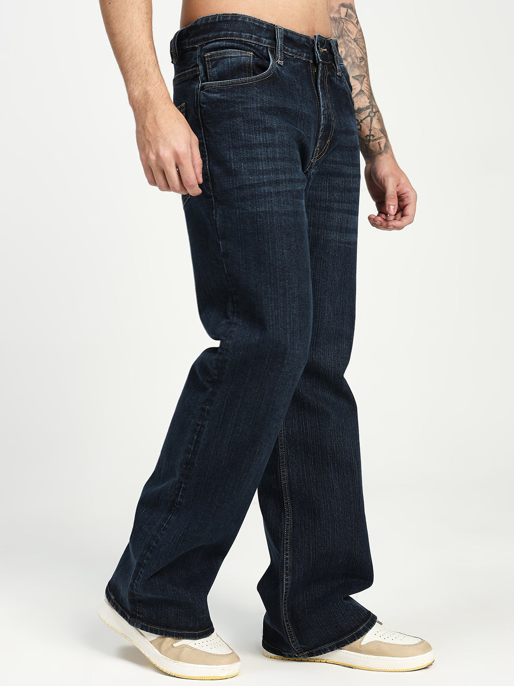 Man Wearing Bell Bottom Jeans on white background 