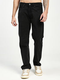 man wearing black ecru jeans on a white background