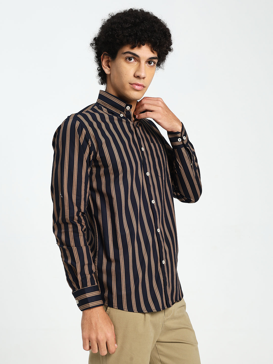 Man Wearing Navy Blue and Brown Striped Shirt