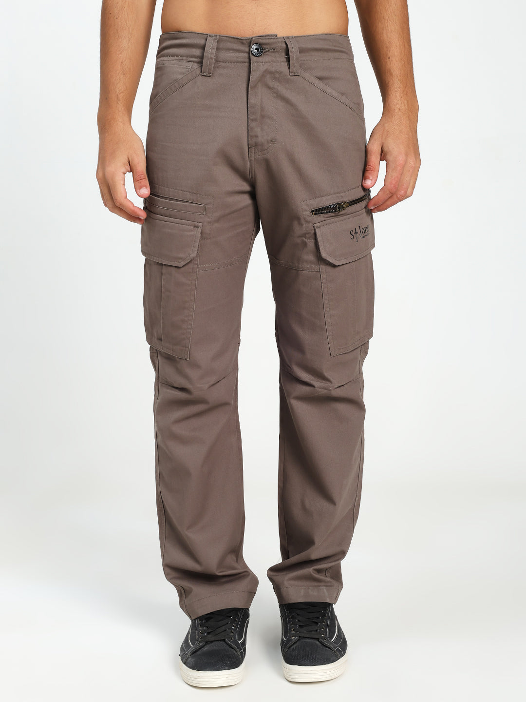 Brown cargo pants worn by a man on a white background
