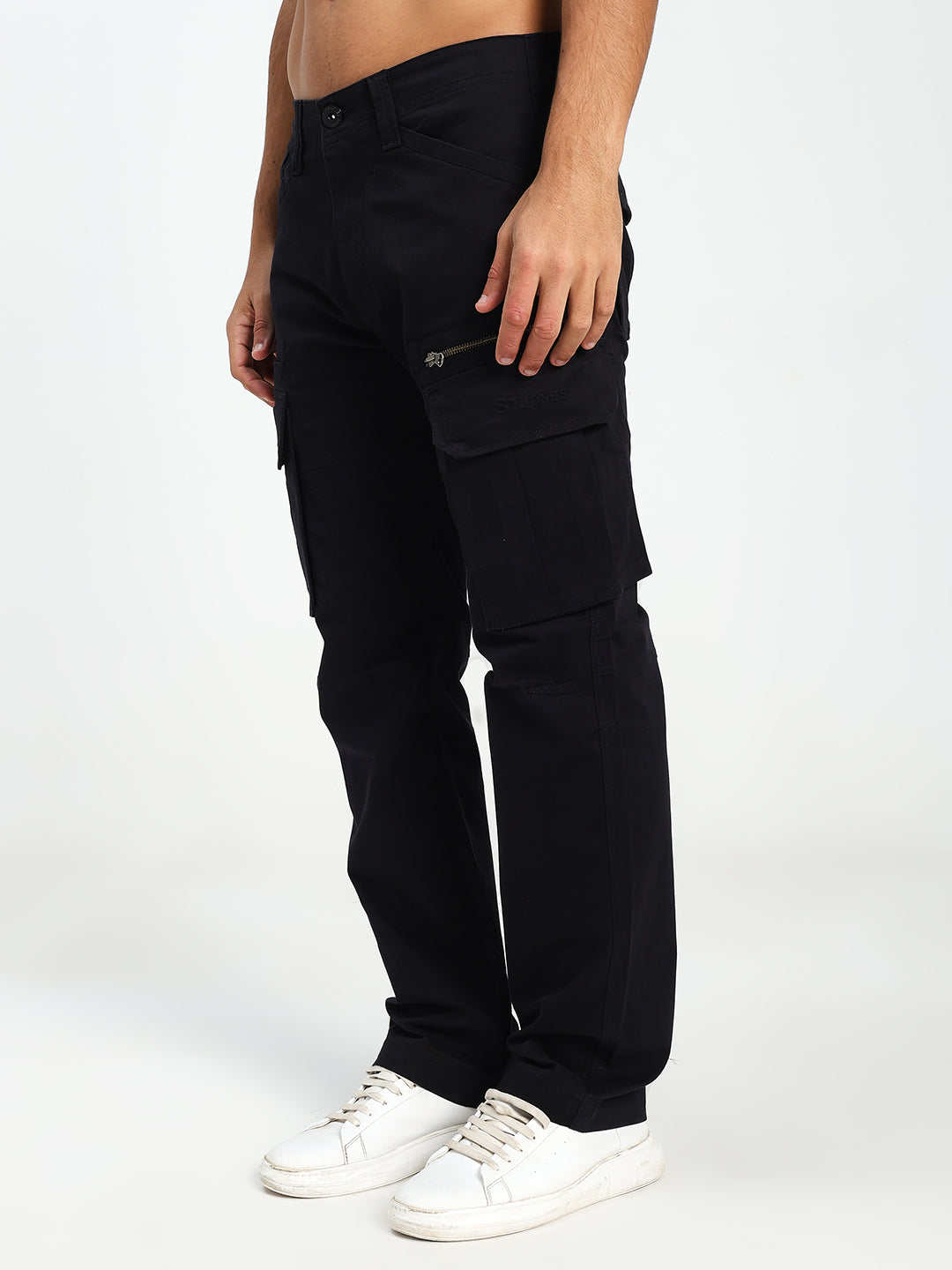 man wearing black cargo pants on a white background
