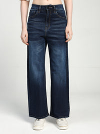 women wearing blue wide-leg jeans on a white background