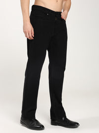 man wearing black jeans on a white background