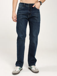 man wearing blue jeans on a white background