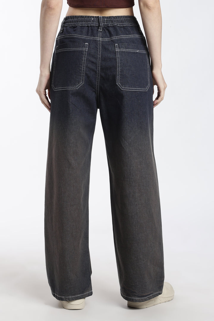 woman wearing vintage wash wide-leg jogger on a white background