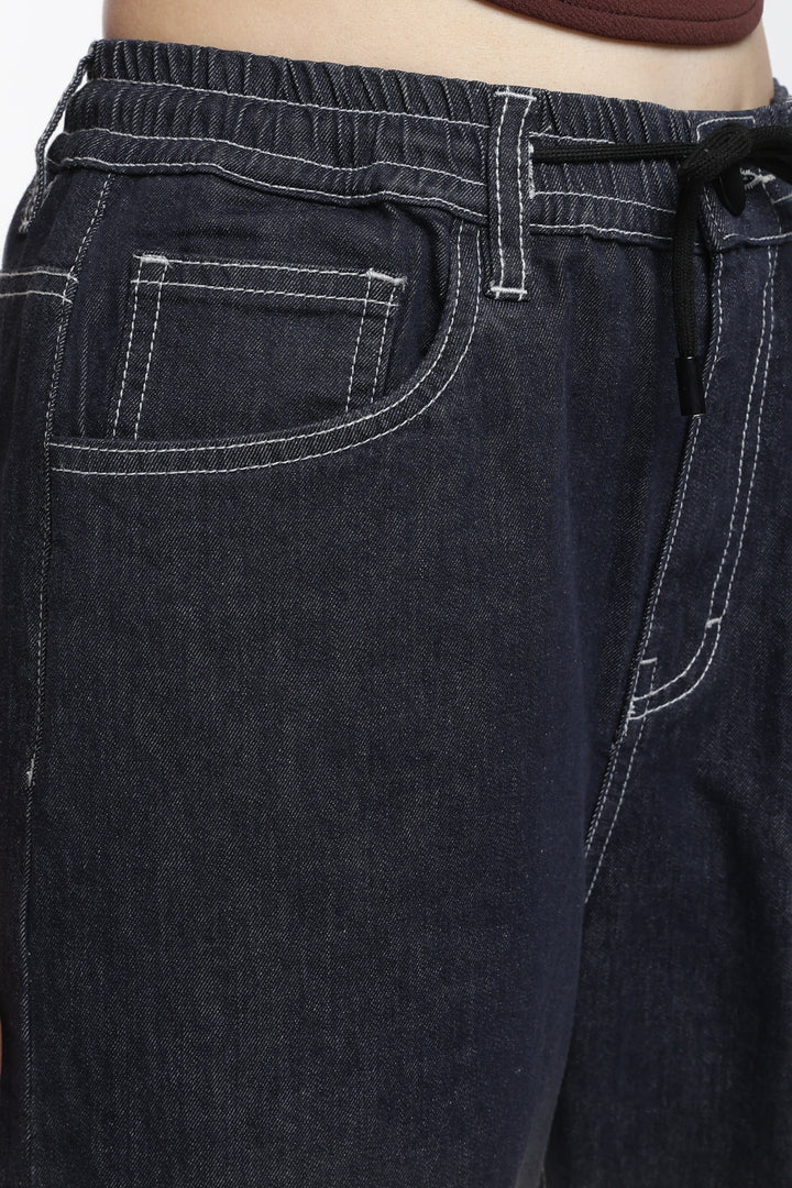 Close-up of vintage wash jogger with a focus on the waistband and pocket area.