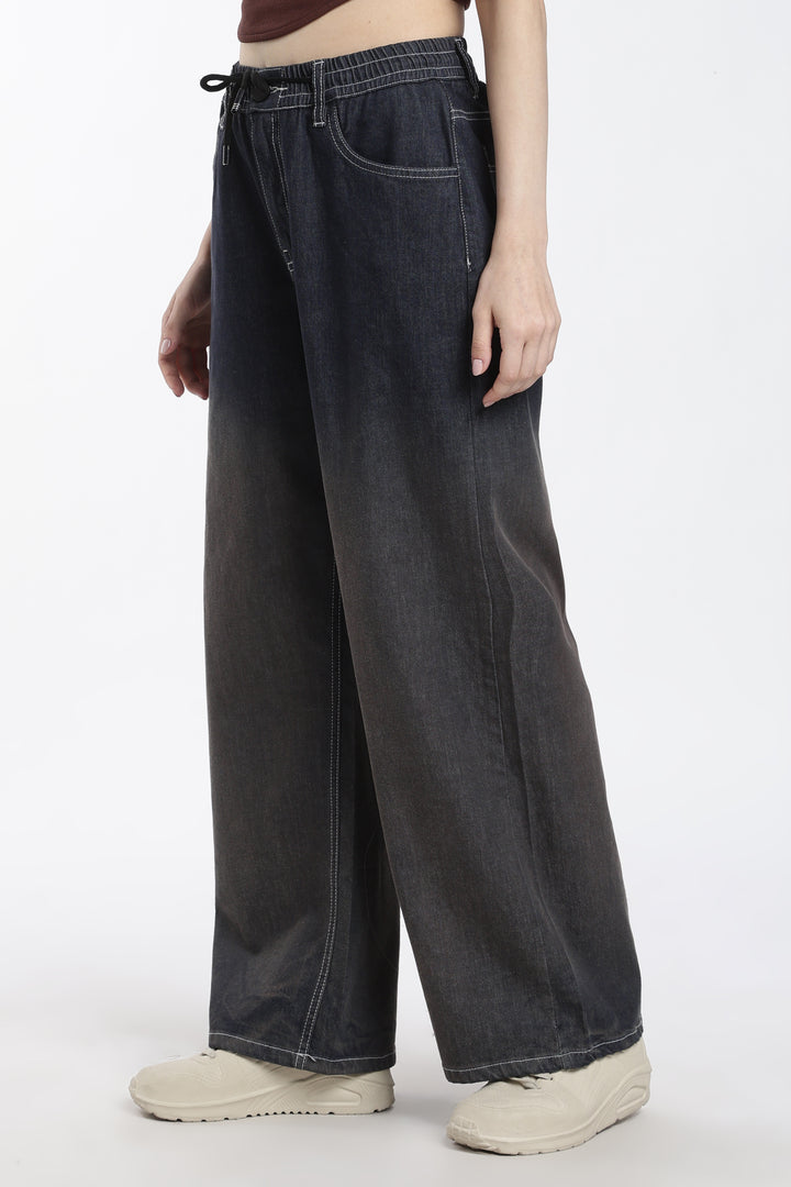 woman wearing wide-leg vintage wash jogger on a white background