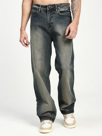 man wearing blue jeans on a white background