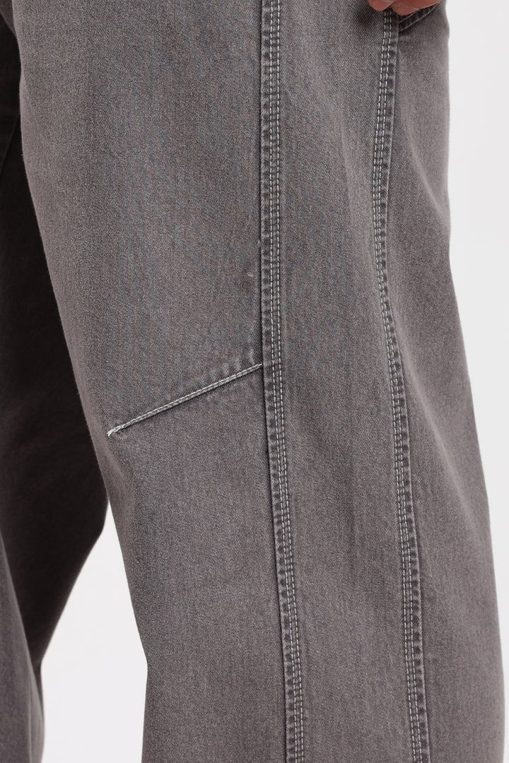 Close-up of gray jogger with a pocket on a white background