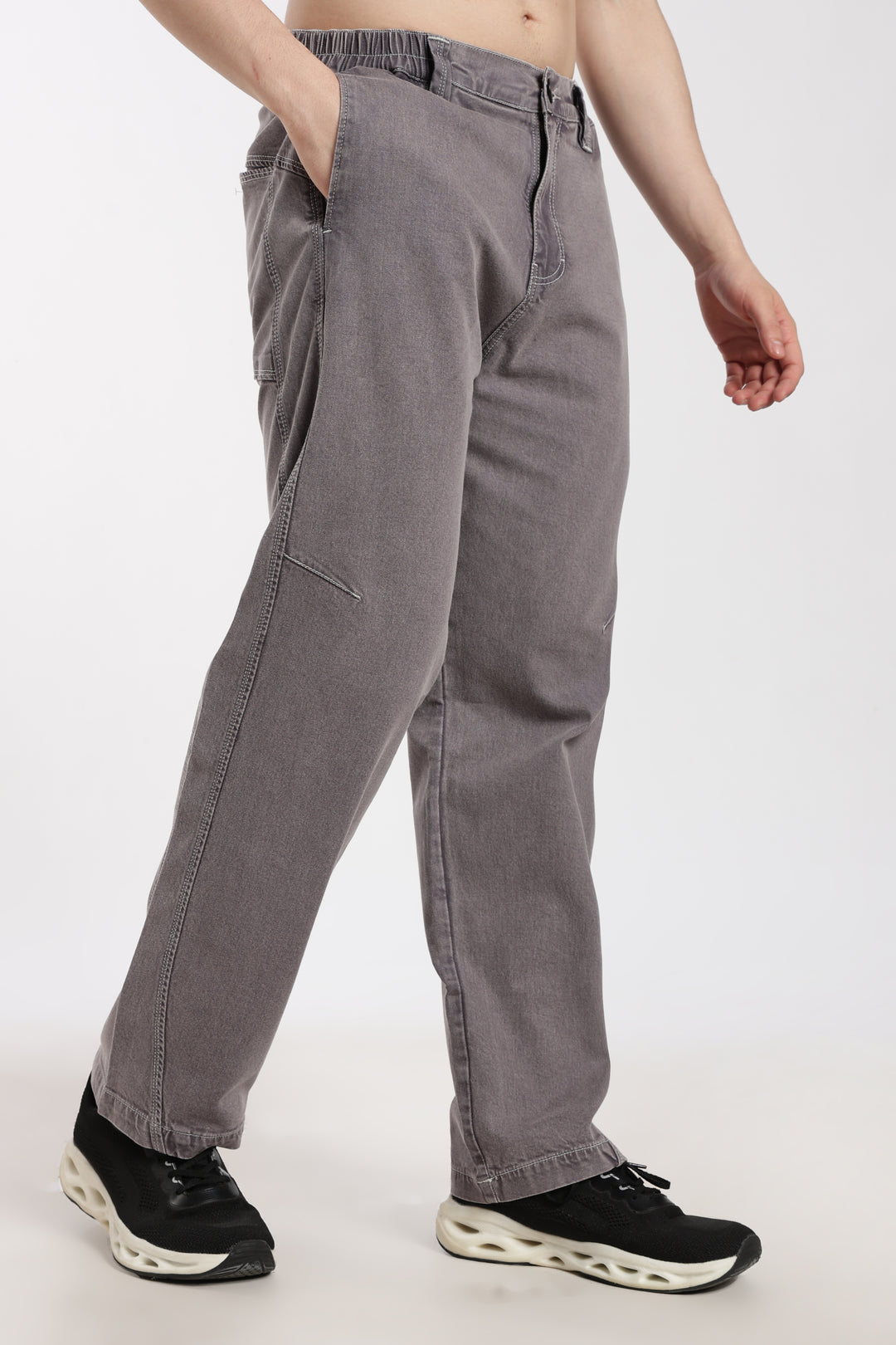 man wearing gray jogger white background