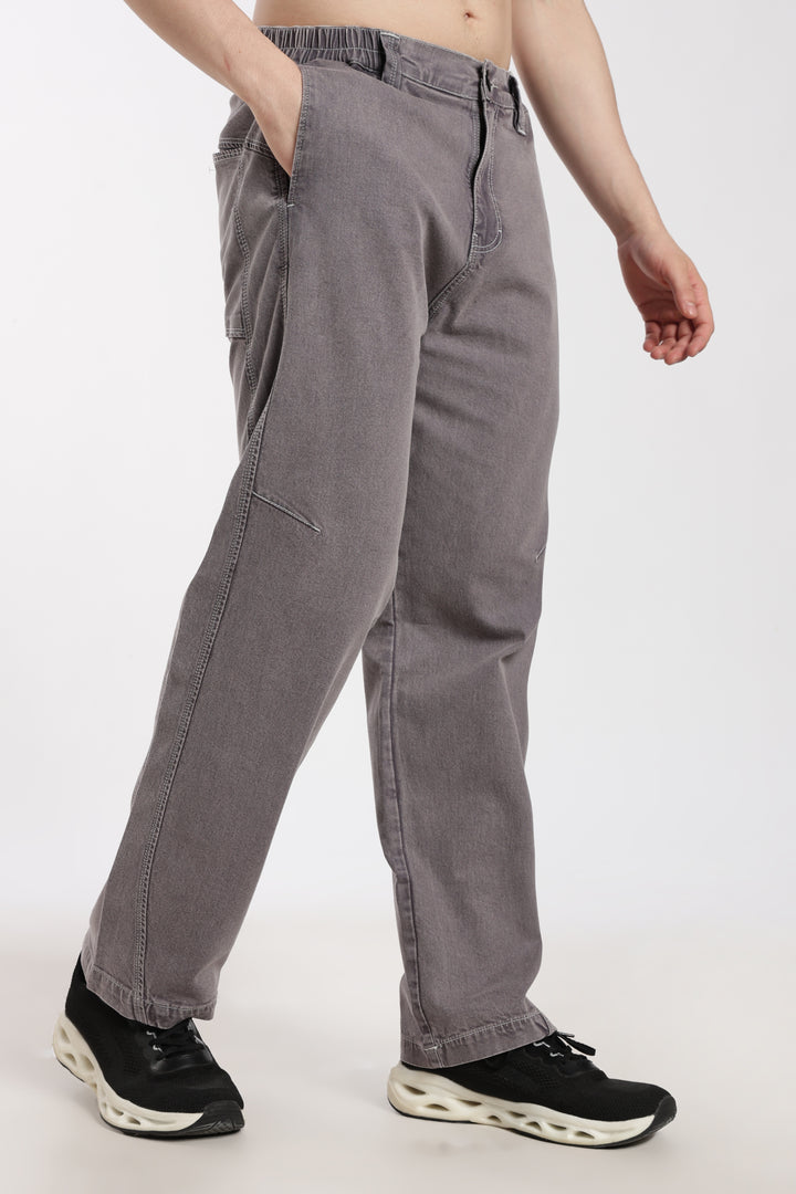 man wearing gray jogger white background