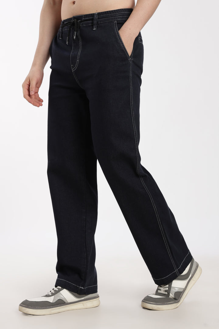 man wearing blue jogger on a white background