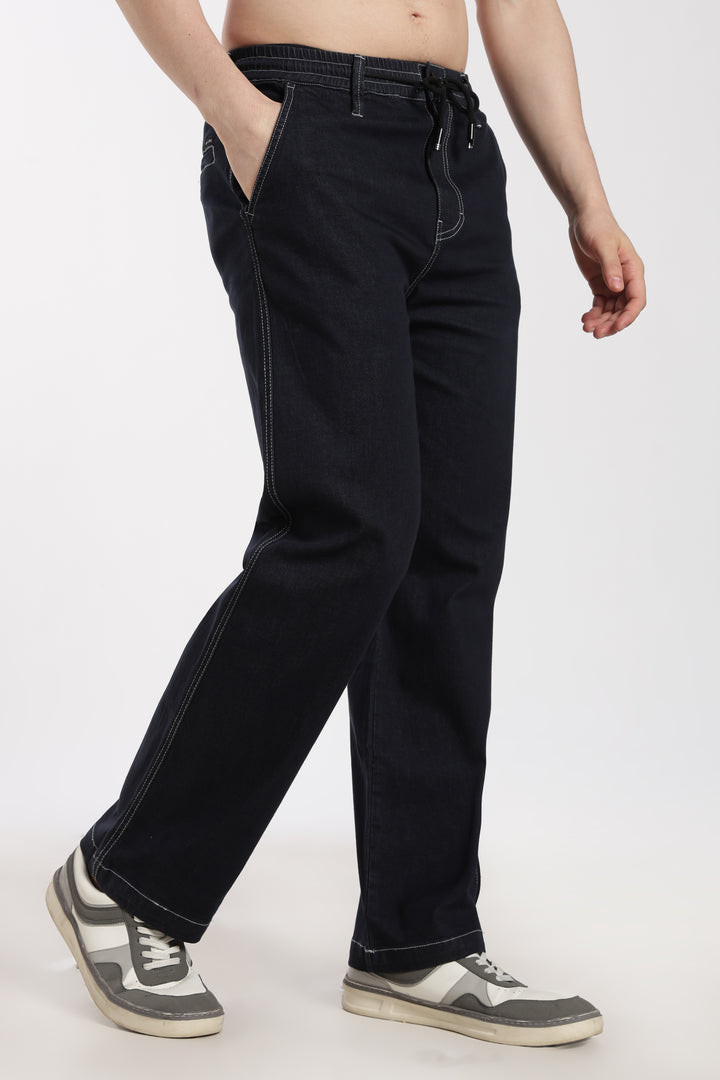 man wearing blue jogger on a white background