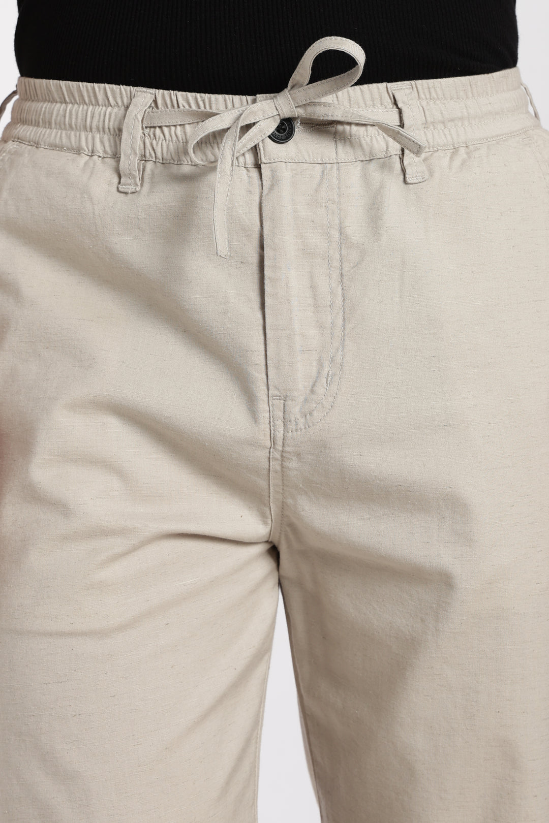 desert sand pants with a drawstring on a white background