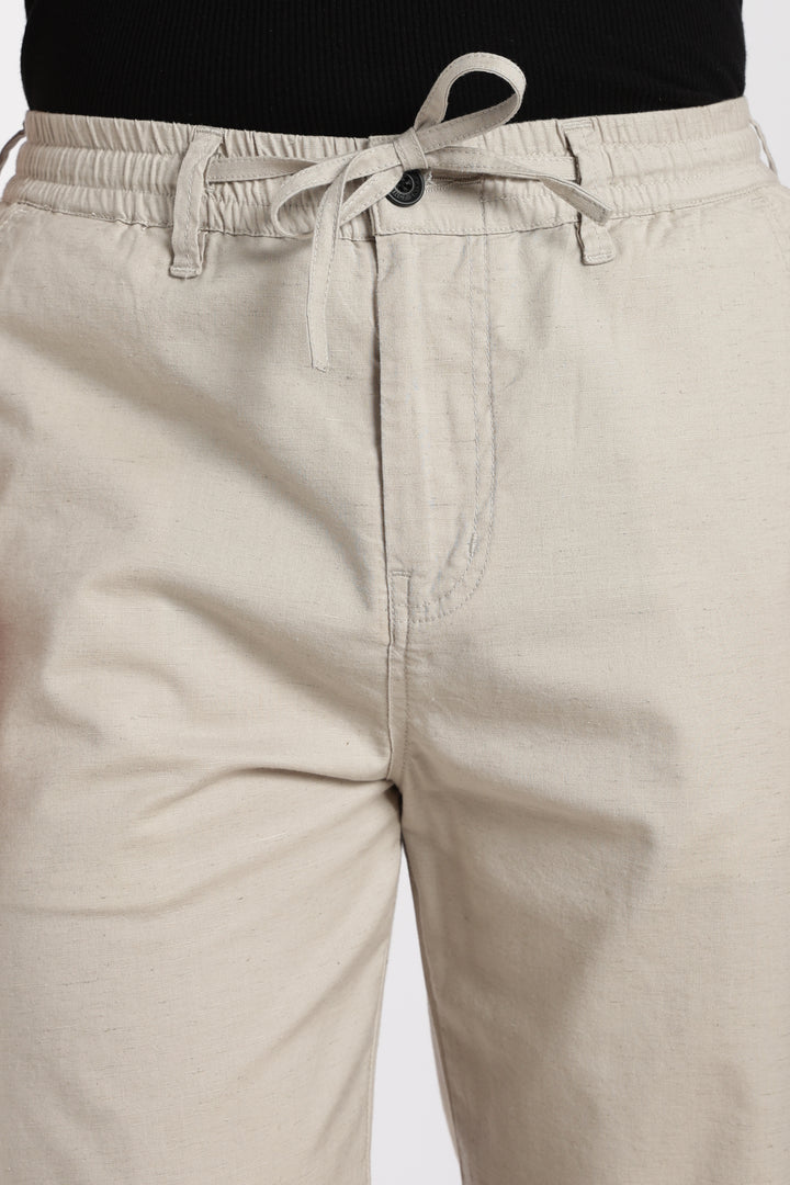 desert sand pants with a drawstring on a white background