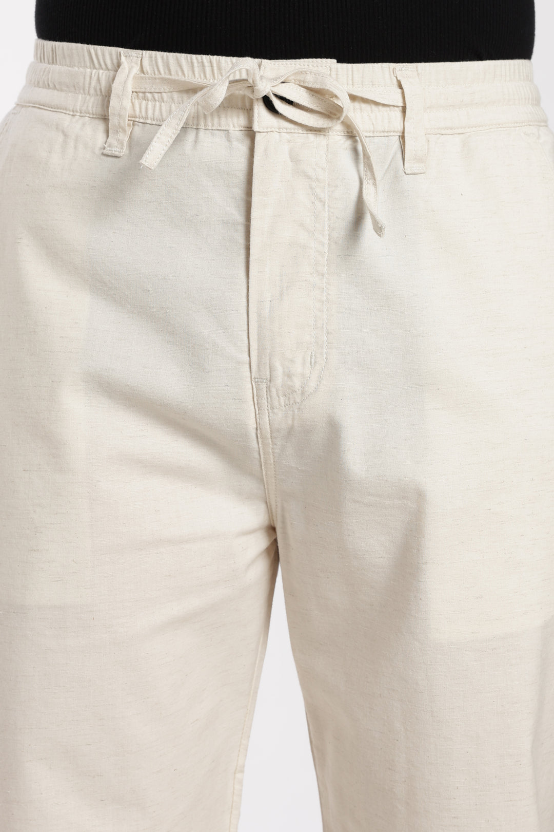cream linen pants with drawstring on a white background
