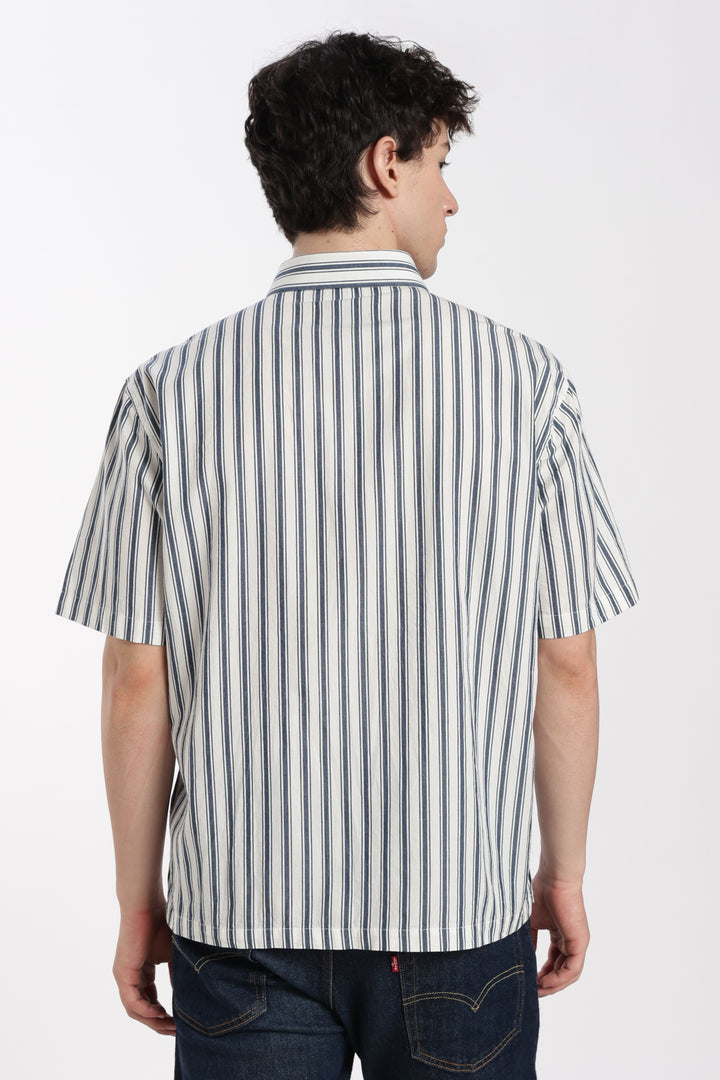 man wearing a striped half sleeve shirt from behind on a white background