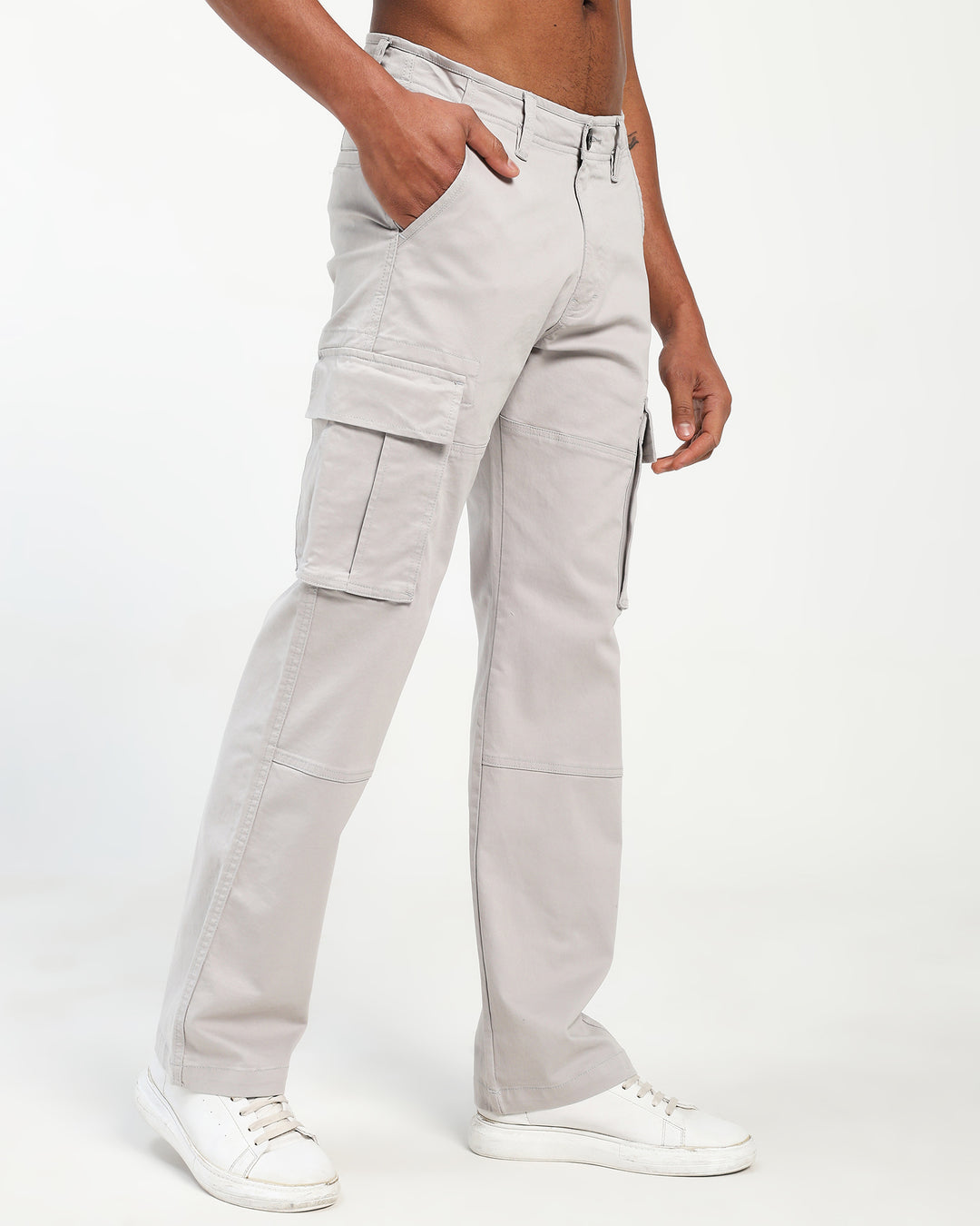 Light gray cargo pants worn by a man on a white background