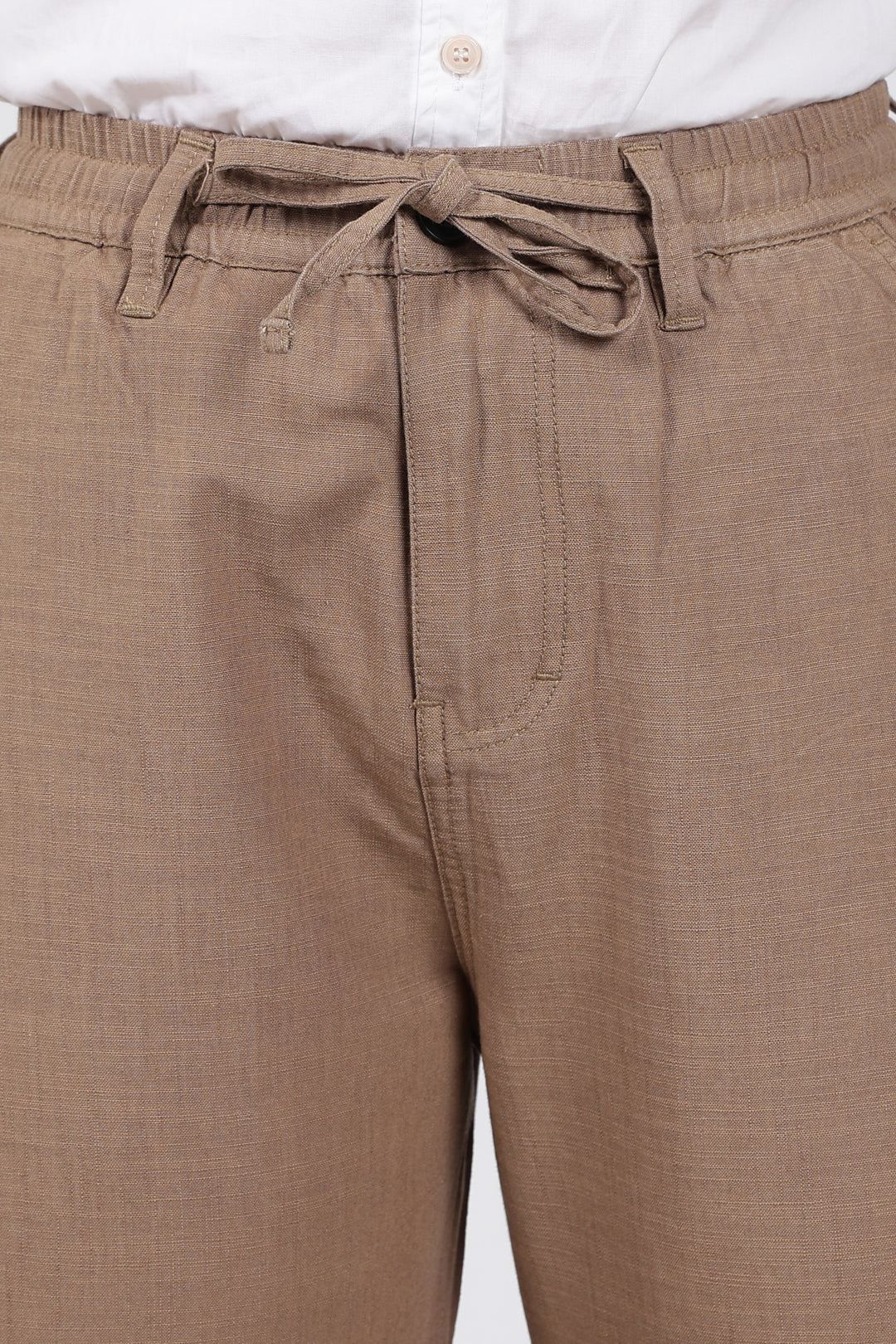 Brown pants with a tie waist on a white background